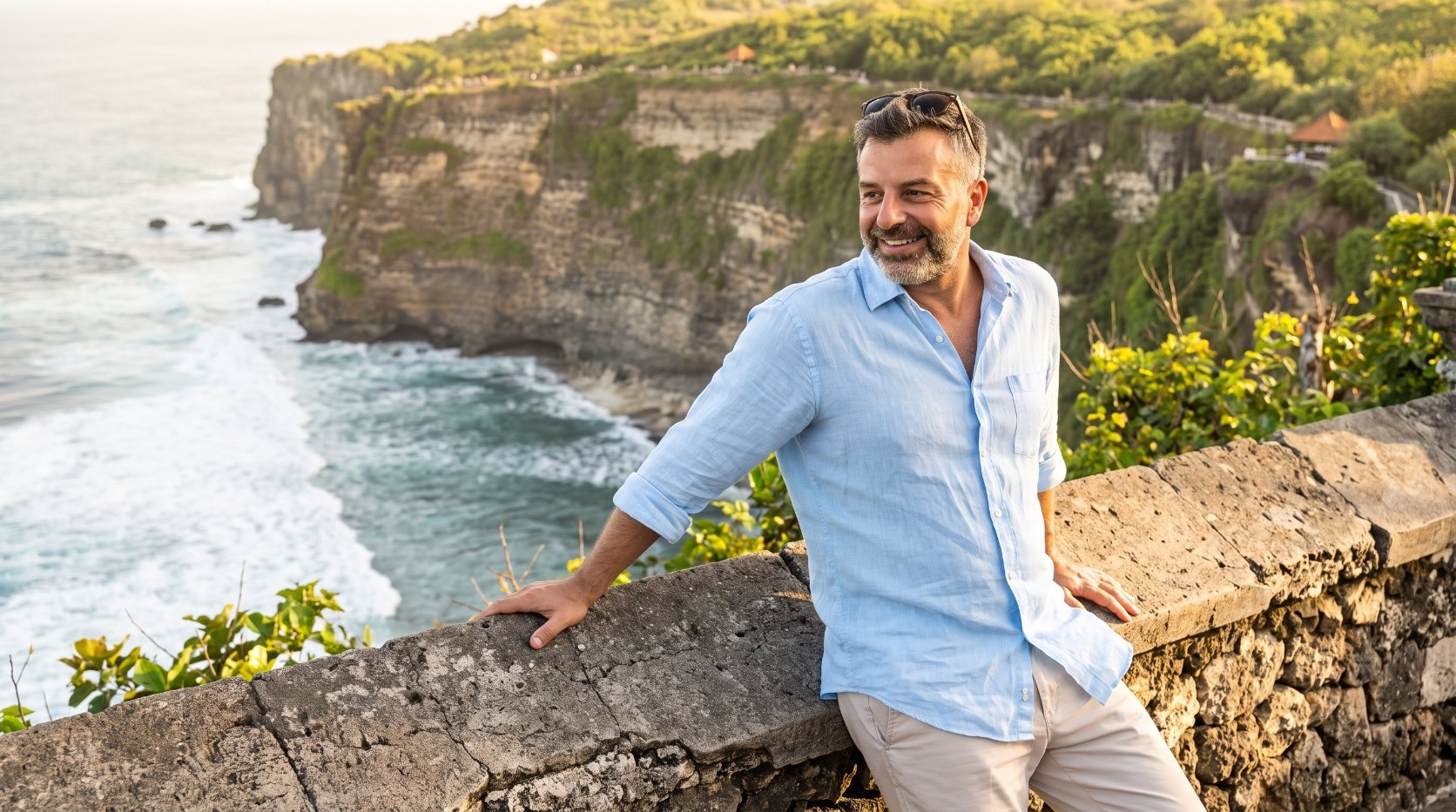 Emre Konuralp at a clifftop viewpoint over the ocean in Uluwatu — AI editorial illustration